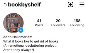 A cropped screenshot of my private Instagram account called “book by shelf” or bookbyshelf. The profile picture is of a tall bookcase full of books. The bio states: “What it looks Like to get rid of books. (An emotional decluttering project. Aren’t they always?)”